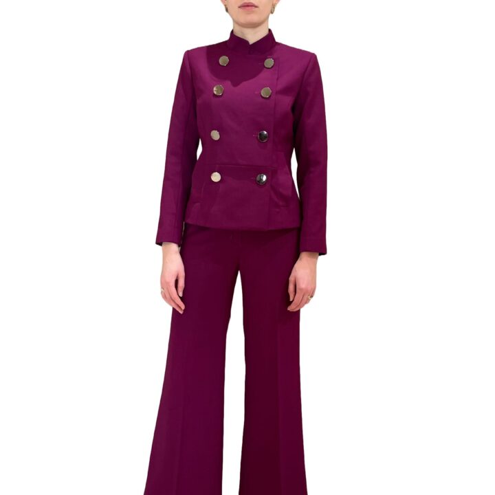 Woman's suit with double breasted magenta jacket and magenta pants